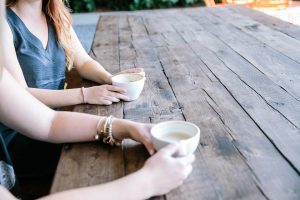 woman talking over coffe