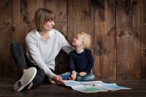  A Mother showing something to her child