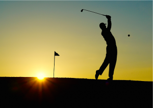 A man playing golf, since this Neighbor hood promotes sports and health it is one of the best neighborhoods in Orlando for families