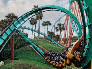 People riding a roller coaster at Busch Gardens.