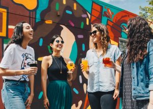 Young women laughing.