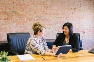 Two women at a job interview.