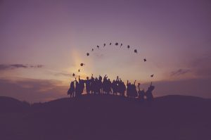 A group of graduates at dawn.