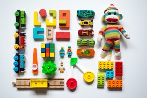 pack toys when moving- toys laying on the floor