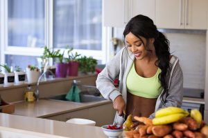 woman slicing fruits