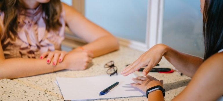 Two woman talking