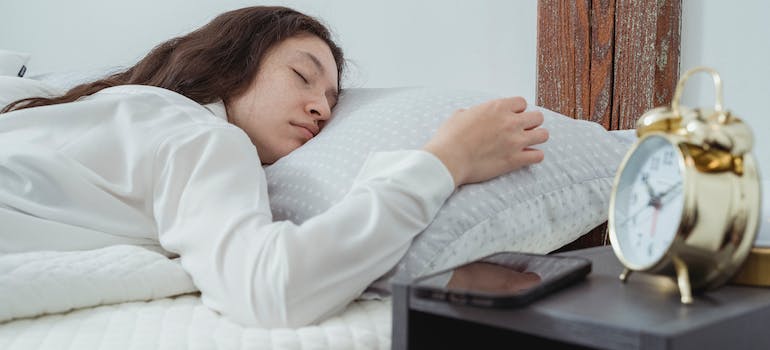 woman sleeping and resting for moving day tasks for an interstate relocation