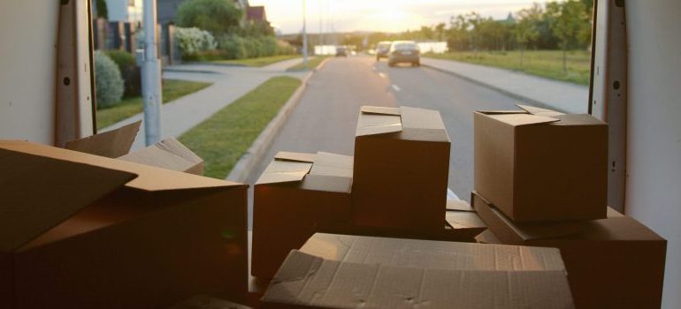 cardboard boxes in a van 