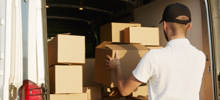 a man lifting the box