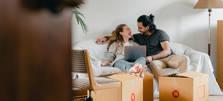 A couple enjoying their move with the best movers in Coral Gables