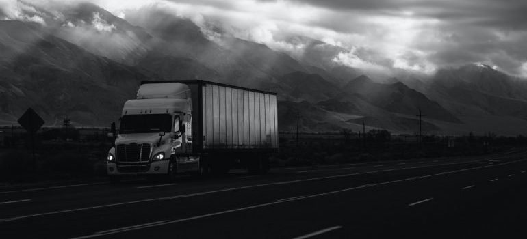 moving company truck on the road