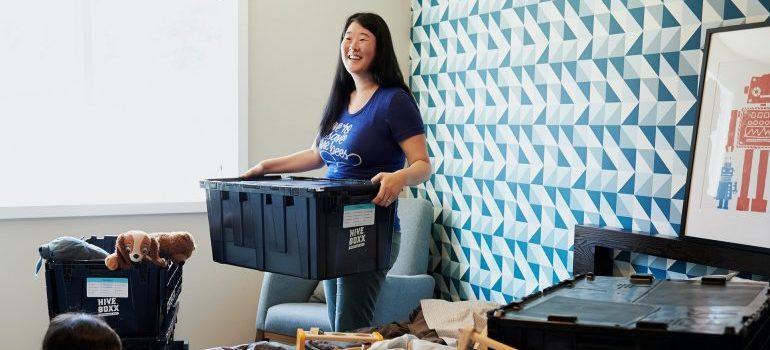 woman packing for the move