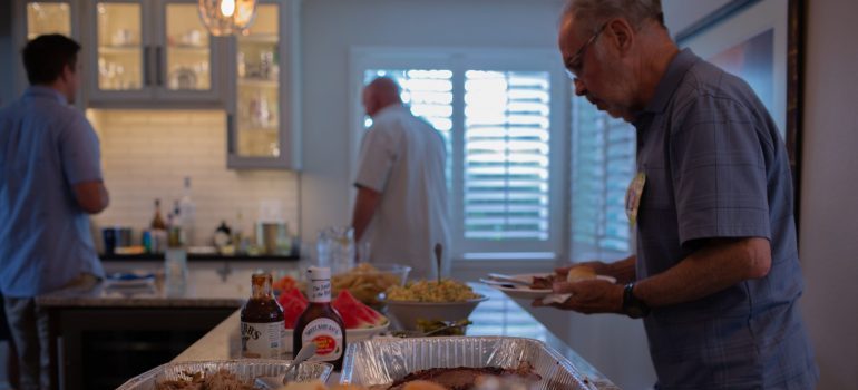 Person standing in the kitchen