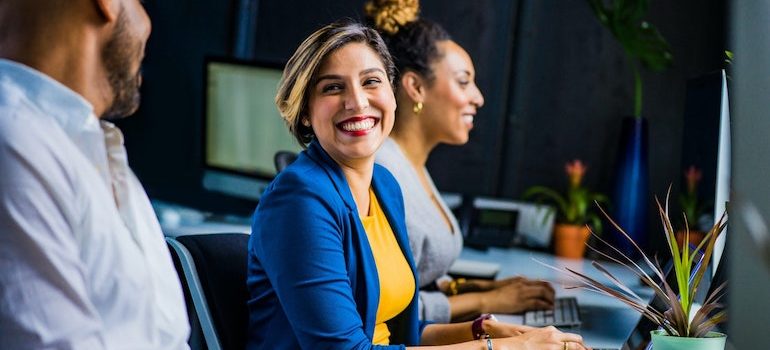 People working in the office and smiling