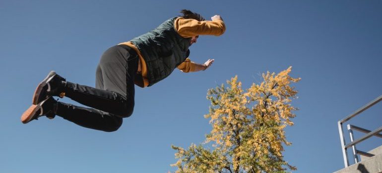 A person mid-leap.