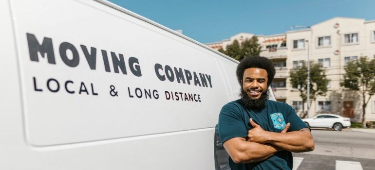 Clearwater movers standing next to a van