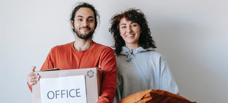 couple waiting for Lake City movers