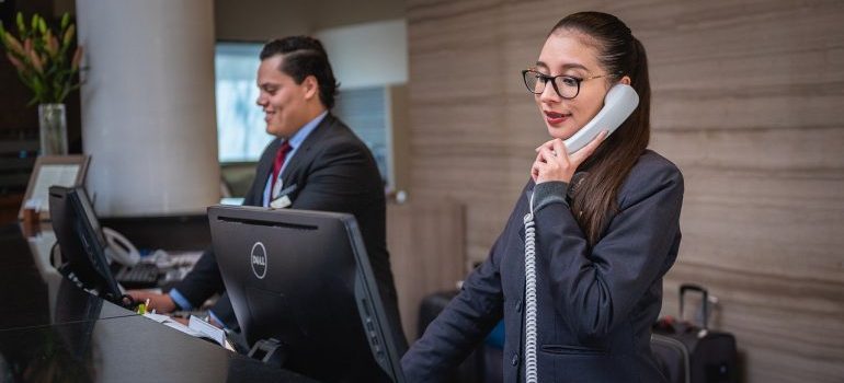 Two Customer service representatives on the phone 