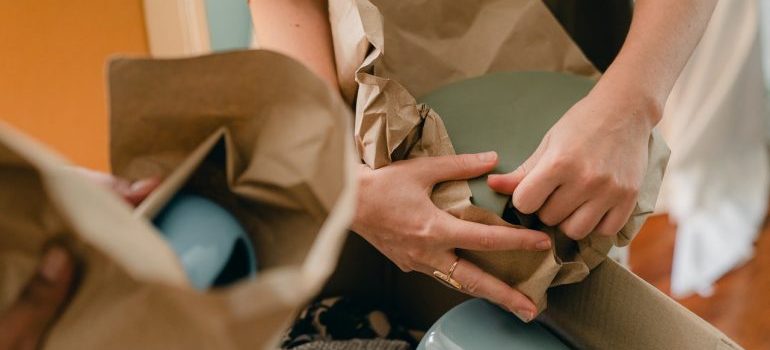 Person packing belongings