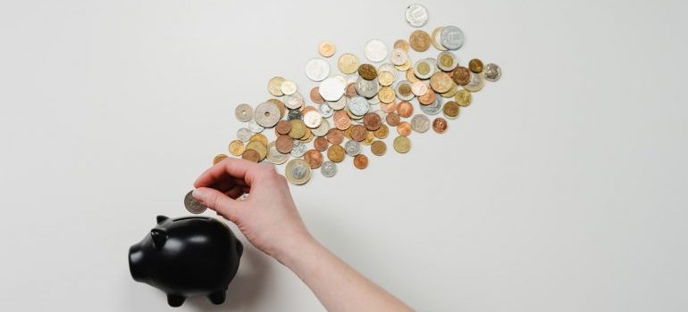 coins spilling out of a piggy bank