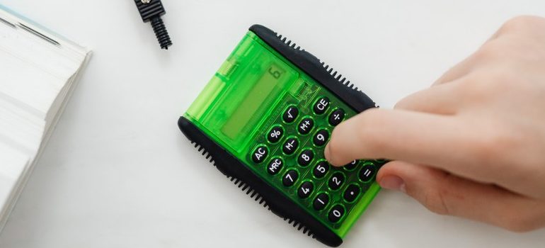 person using a calculator