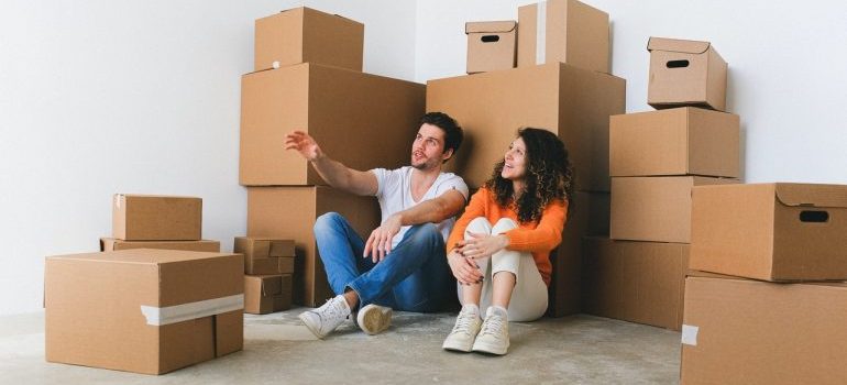 couple waiting for residential movers St Pete Beach to arrive