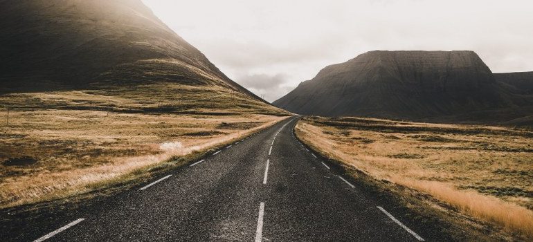 an asphalt road in the countryside