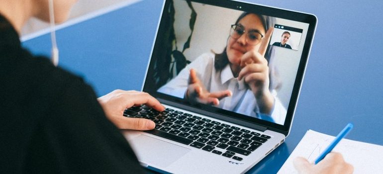 person using a laptop for a video call