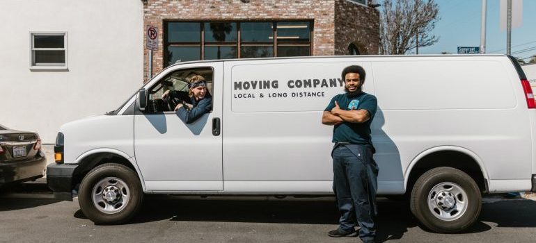 local movers Arcadia standing next to a van