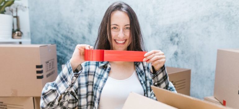 A woman smiling during the move.