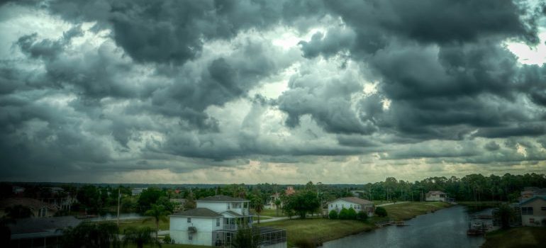 Grey large clouds over a city in Florida.