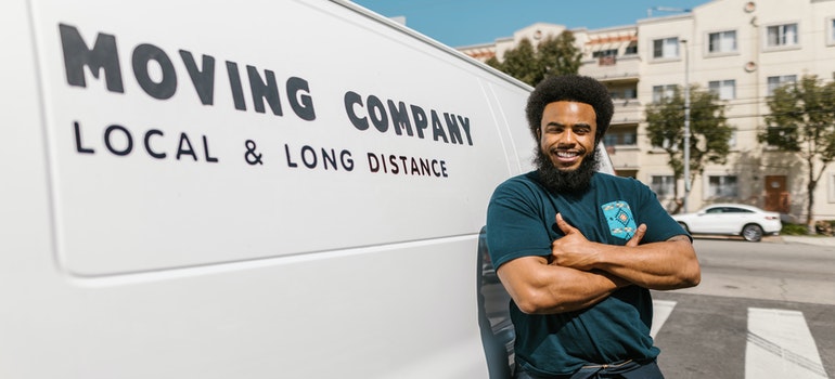 a man standing in front of a van