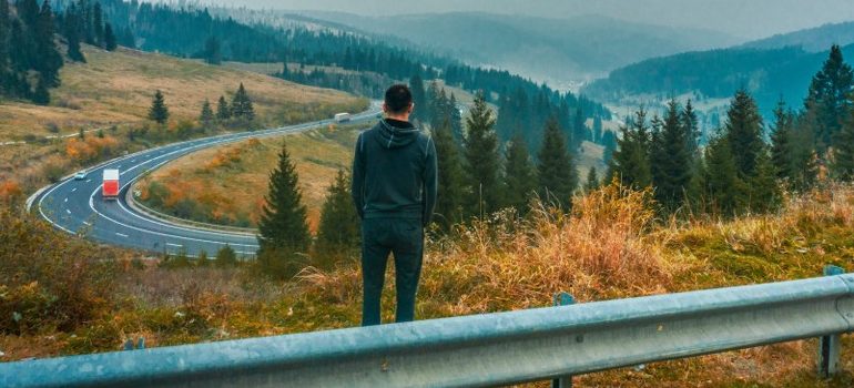 person looking at a highway