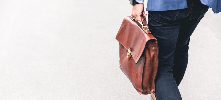 a man holding a briefcase 