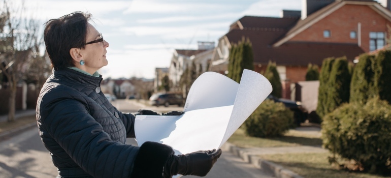 a woman looking for a house because she is moving to Edgewater