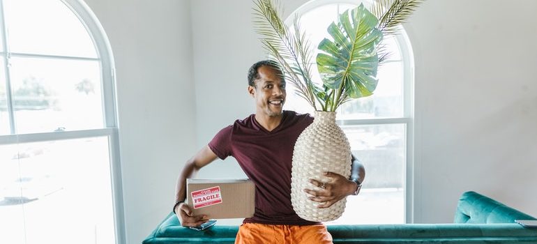 man waiting for commercial movers Lake Worth to arrive