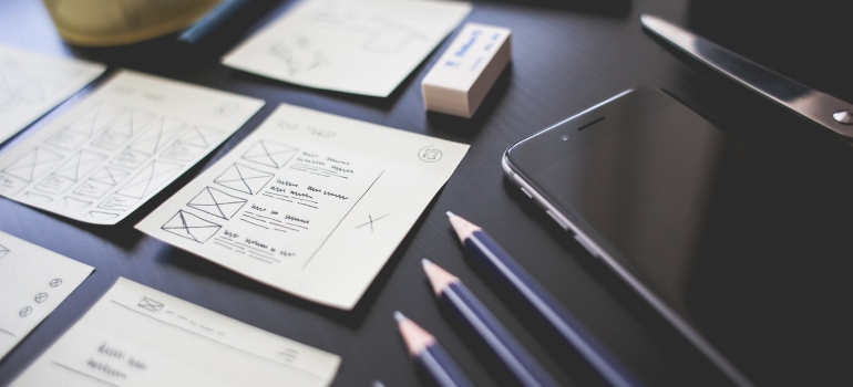 office materials such as pencils and notebooks on a desk