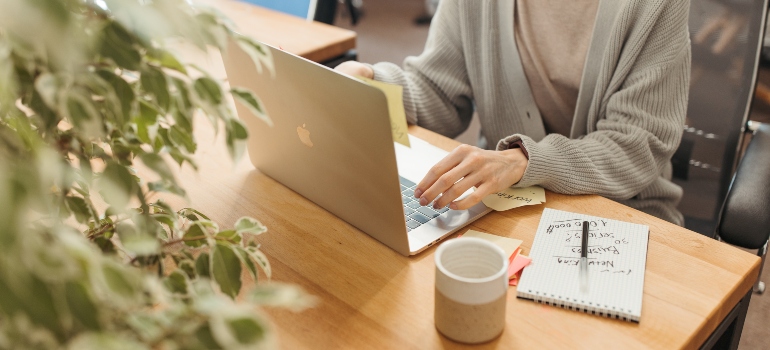 a woman using a laptop