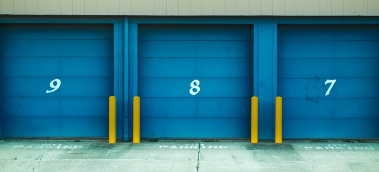 Three storage units next to each other representing everything you need to know about self-storage