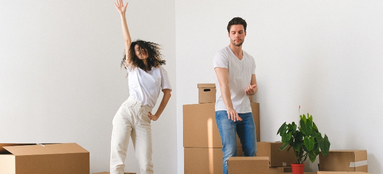 a couple having fun while moving