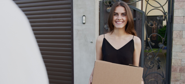 happy woman moving with best movers south miami