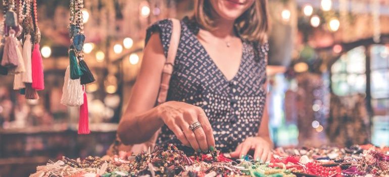 a woman purchasing jewelry