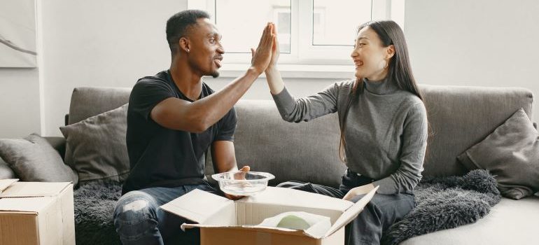 man and woman moving house