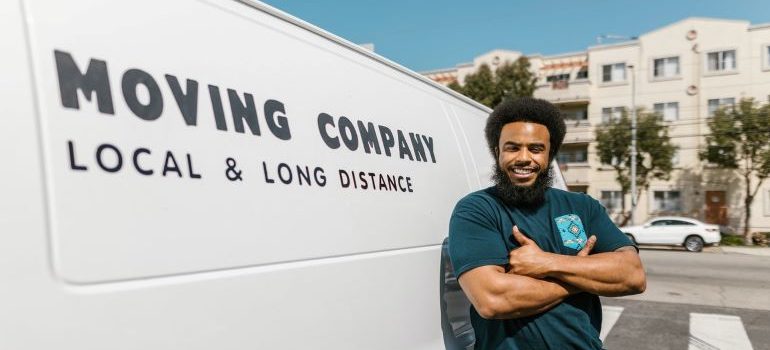 a mover in front of a truck