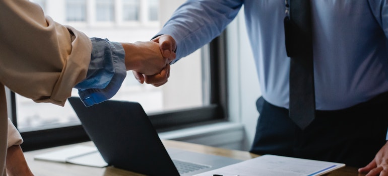 Two people shaking hands