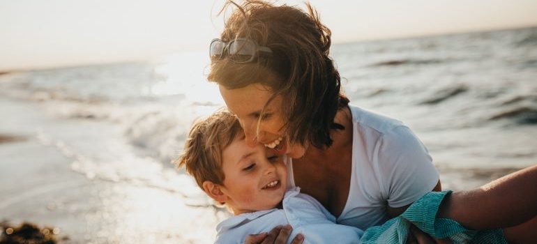 woman and child on a beach after moving with long-distance movers Key West FL