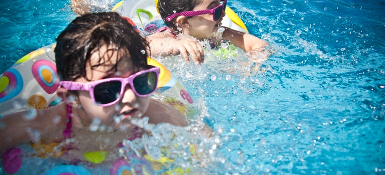 Two girls in a swimming pool