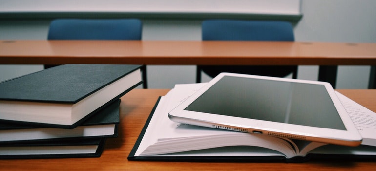 Books and tablet on a desk