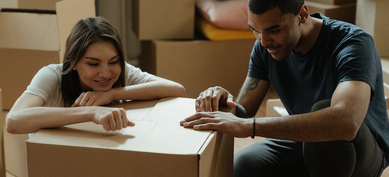 A couple packing a box