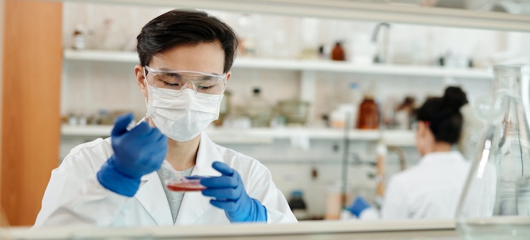 Man Doing A Sample Test In The Laboratory.